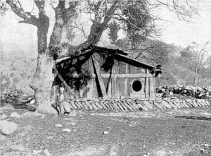 Hoopa Valley Indian House (Squaw in Front)