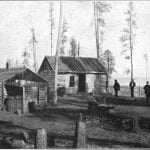Trader's store at the village of the Pillagers, Cass Lake in the distance on the right. November 26, 1899.