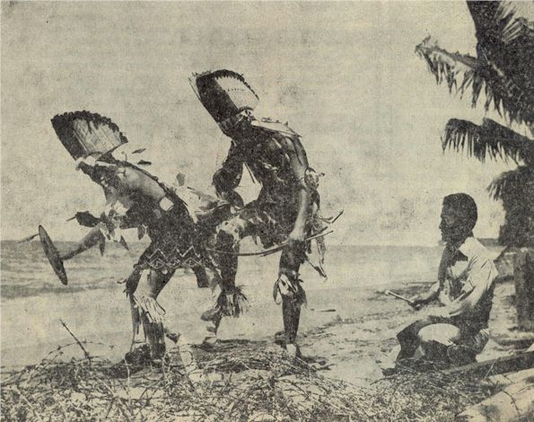 Navajos dance on a beach in the Solomons